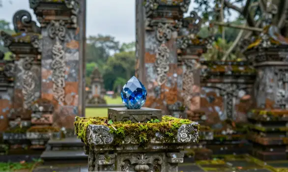 Crystal Ball on Stone Pedestal in Temple intricate carvings