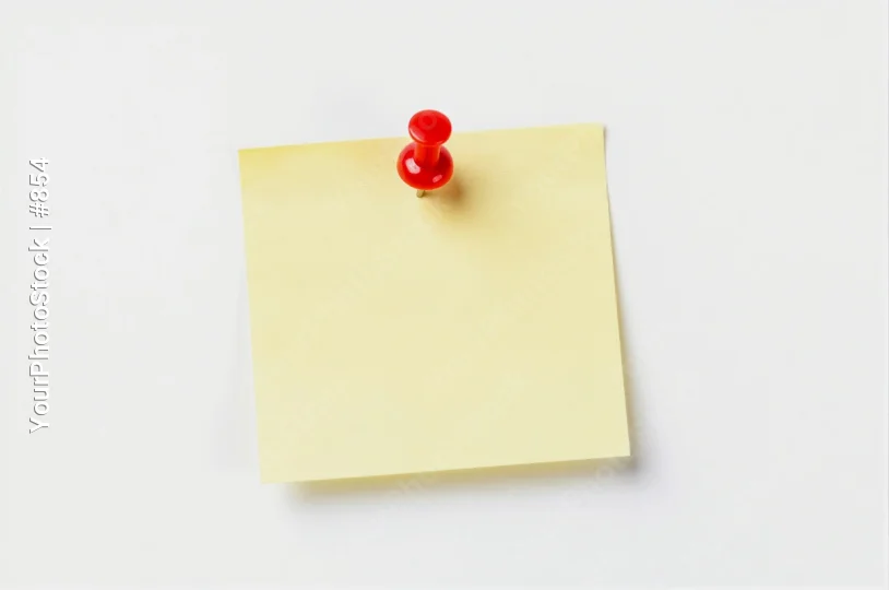 Yellow Sticky Note with Red Pin on White Background