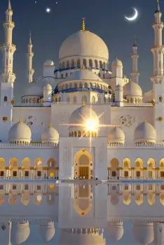 Beautiful White Mosque with Minarets and Domes Reflecting in Water at