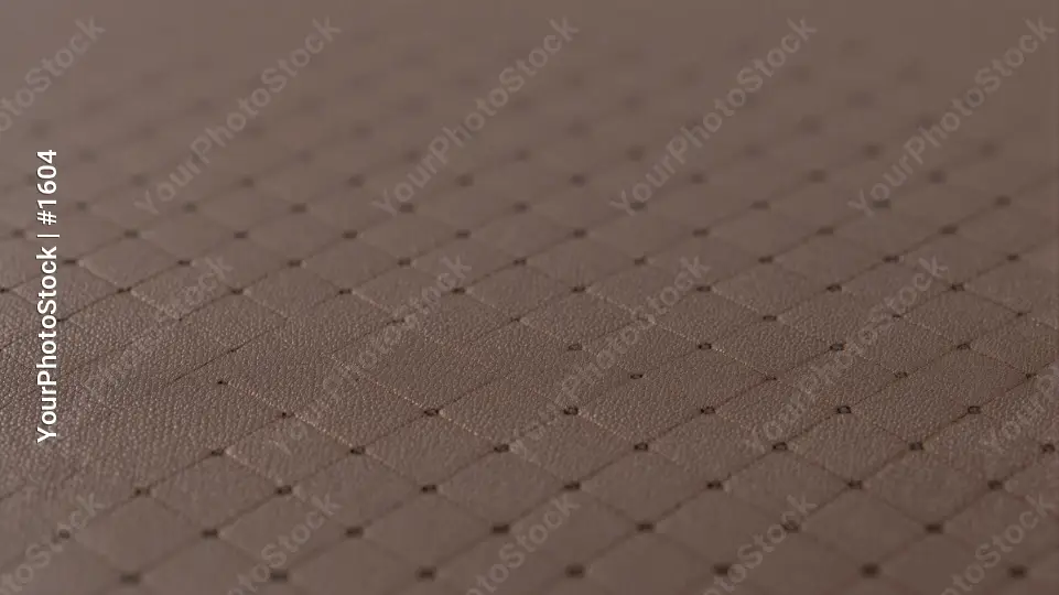 Textured Light-Colored Leather Diamond Pattern Surface
