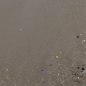 Close-up of Rough Gray Surface with Small Particles and Objects