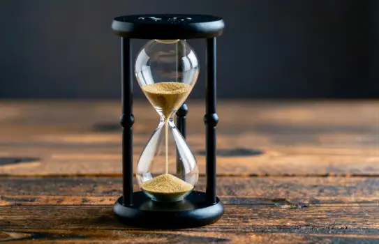 Sand Hourglass on Table time