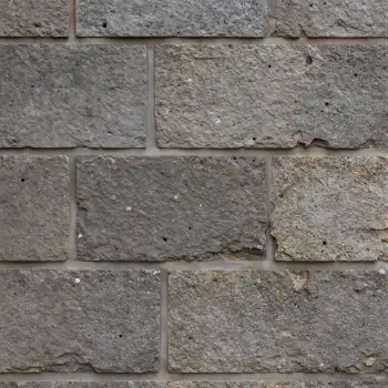 Weathered Brick Wall Close-Up grid pattern overlapping bricks texture