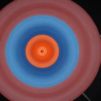 Red and Blue Circular Object with Orange Center