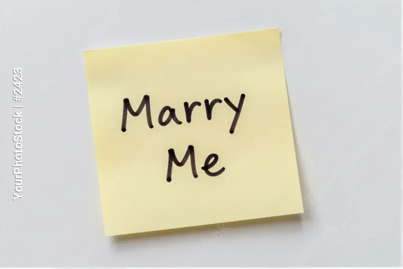 Yellow 'Marry Me' Sticky Note on White Background