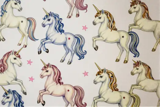 Nine Unicorns in Different Poses on White Background