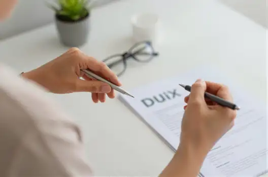 Person Signing Document office workspace