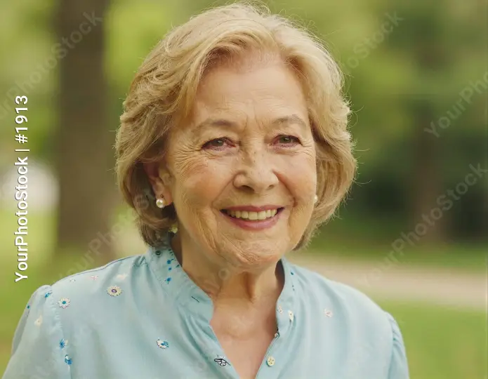 Elderly Woman Smiling in Park, Happy Portrait