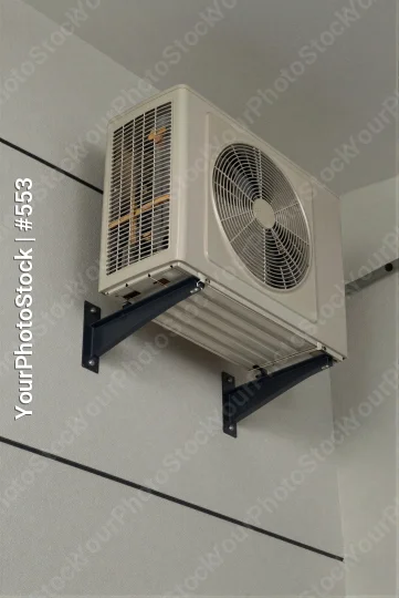 White Air Conditioning Unit Mounted on Wall installation