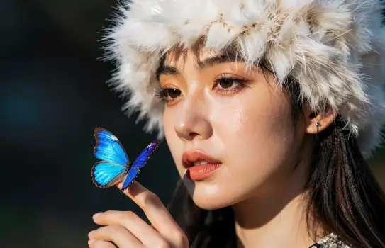 Stylish Woman with Blue Butterfly asian young woman