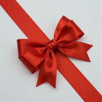 Red Ribbon with Large Bow Close-Up shiny satin gift
