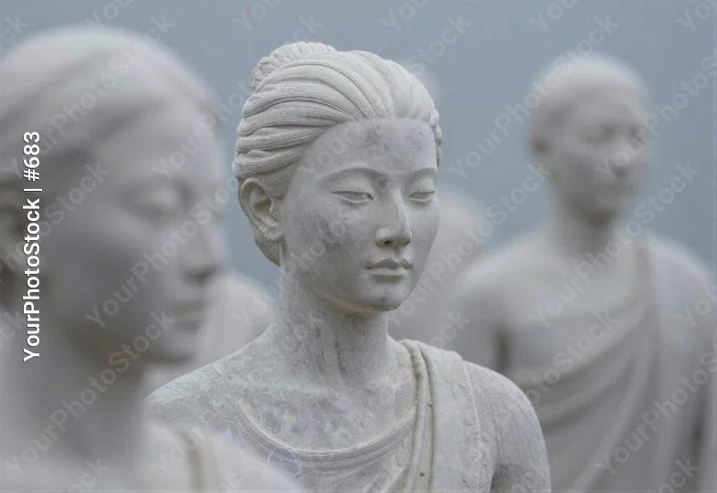 Close-up of Three White Marble Statues of Women