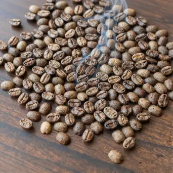 Freshly Roasted Coffee Beans on Wooden Surface