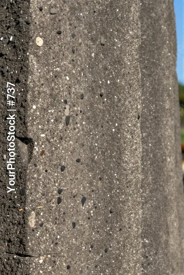 Weathered Concrete Wall with Textured Particles