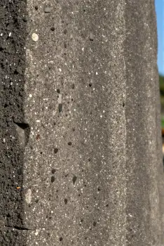 Weathered Concrete Wall with Textured Particles