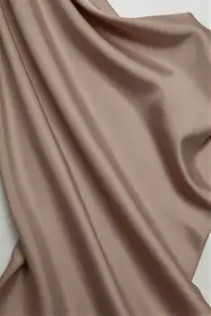 Close-up of Elegant Beige Fabric with Silky Texture