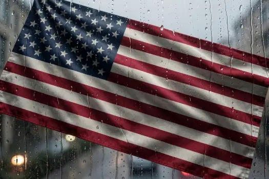 USA United States Flag Hanging on Window with Rain waving
