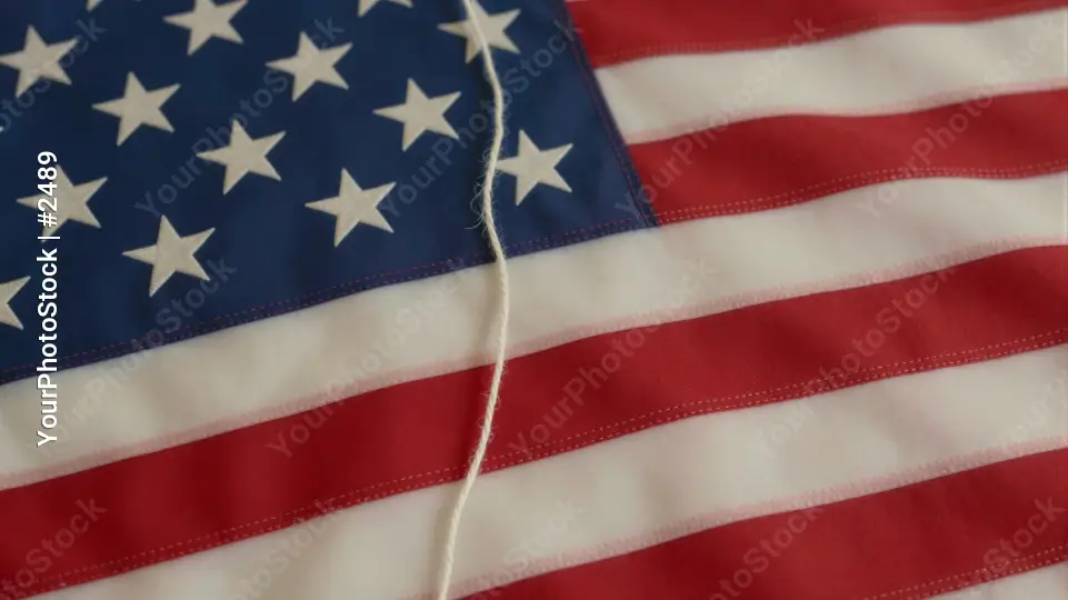 USA American Flag Waving in Wind red white blue ruffled