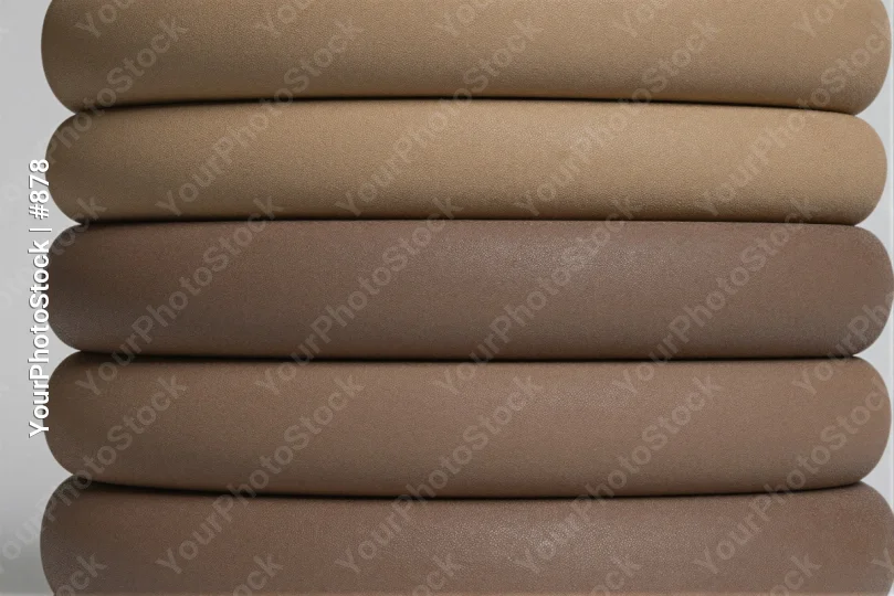 Neatly Folded Sheets Stack textured fabric horizontal leather