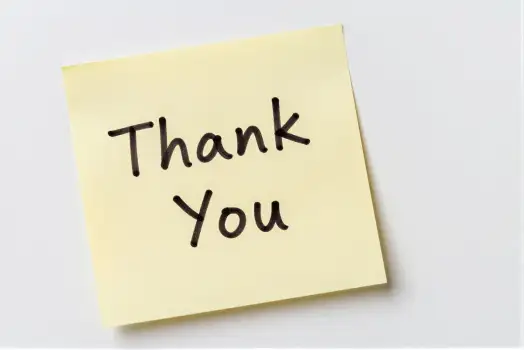 Yellow Sticky Note with 'Thank You' Text cursive text