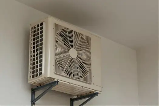 Outdoor Air Conditioning Unit Mounted on Metal Rack