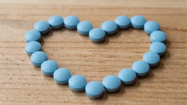 Blue Pills on Heart-Shaped Beads