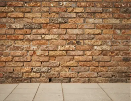 Weathered Brick Wall Close-Up mortar old tiles