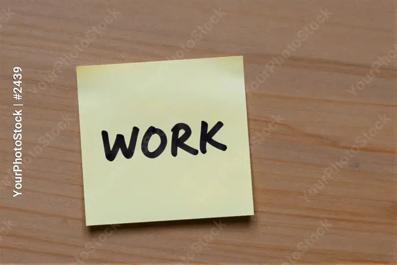 Work Sticky Note on Wood wooden surface organization