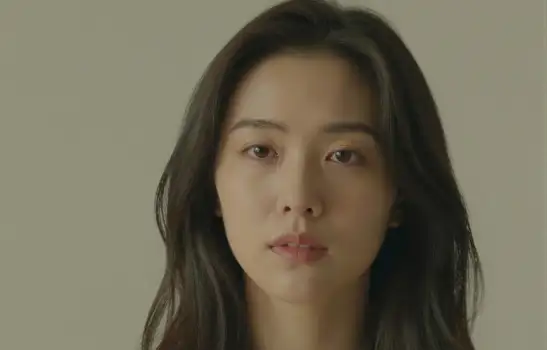 Serious Young Woman with Loose Waves portrait asian