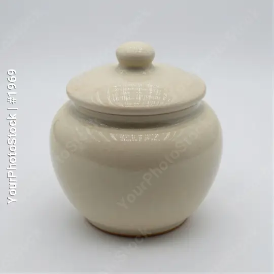 Light Beige Ceramic Jar with Round Lid and Inscription
