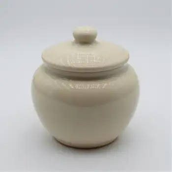 Light Beige Ceramic Jar with Round Lid and Inscription