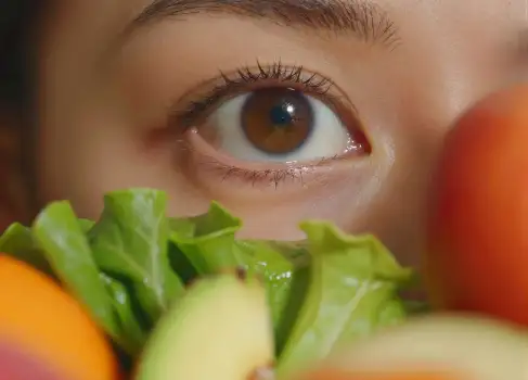 Close-up of an eye with fresh produce fresh vegetables