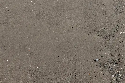 Textured Asphalt Surface with Debris concrete