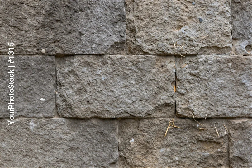 Weathered Stone Wall Close-Up irregular blocks