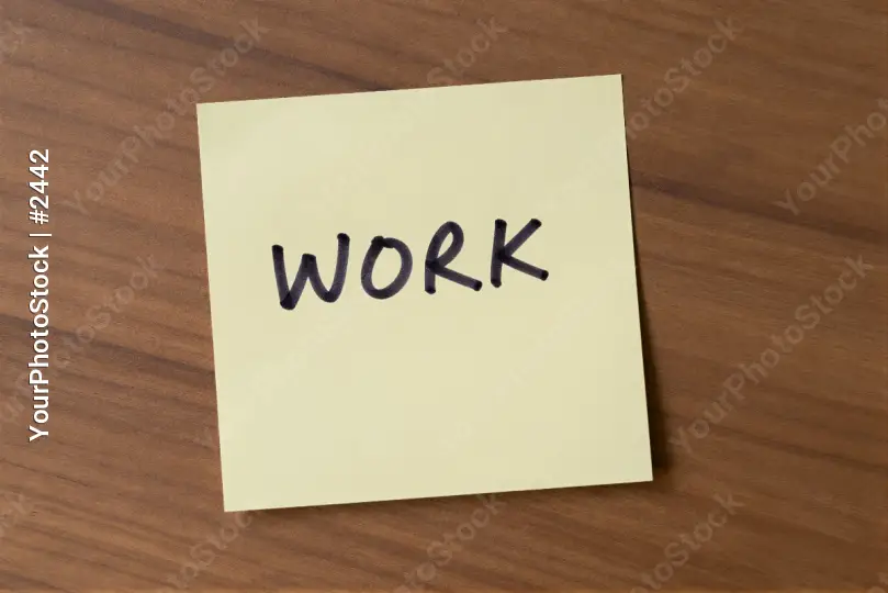 Work Sticky Note on Wood wooden surface organization