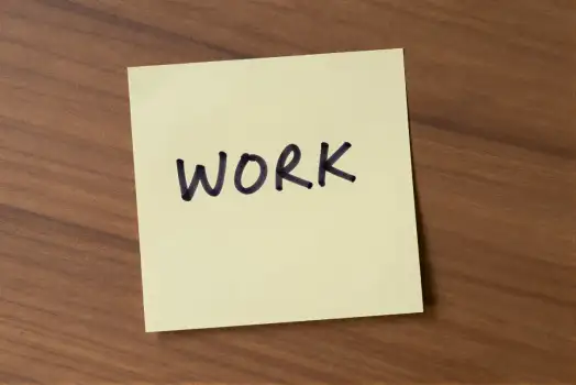 Work Sticky Note on Wood wooden surface organization