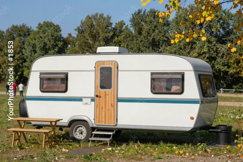 Vintage Caravan in Autumn Park outdoor travel