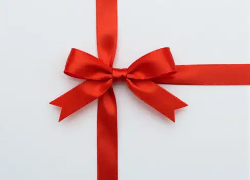 Red Ribbon Bow Close-Up shiny satin elegant sophisticated gift