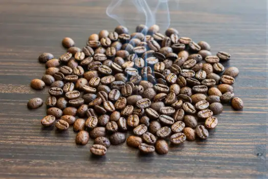 Freshly Roasted Coffee Beans on Wooden Surface