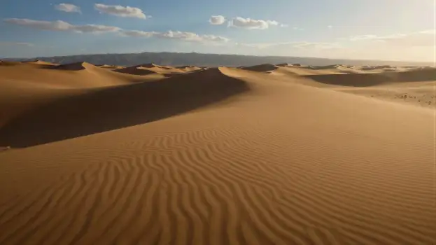 Desert Landscape with Blue Sky and Sun clouds