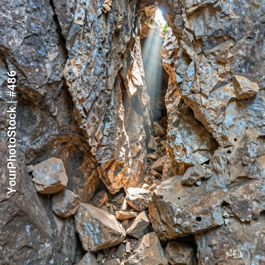Rocky Cliff Face with Waterfall close-up natural landscape