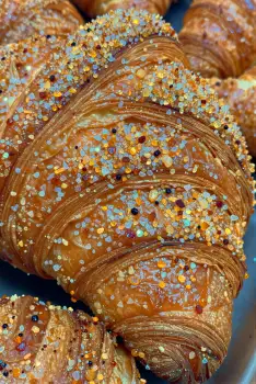 Freshly Baked Croissant with Rainbow Sprinkles