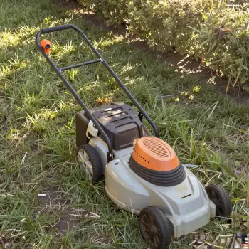 Lawn Mower on Grass Garden outdoor landscape maintenance