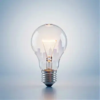 3D Rendered Light Bulb with Warm Glow transparent glass