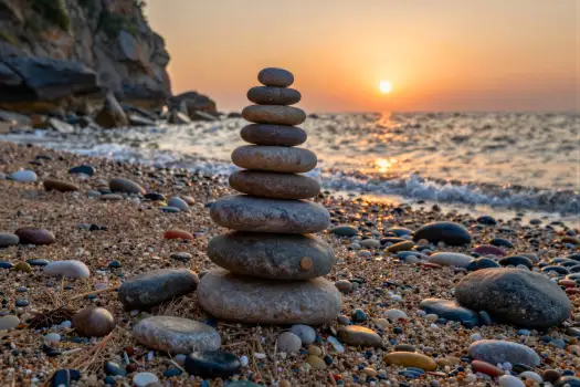 Rocky Beach Sunset with Pebble Stack pyramid nature