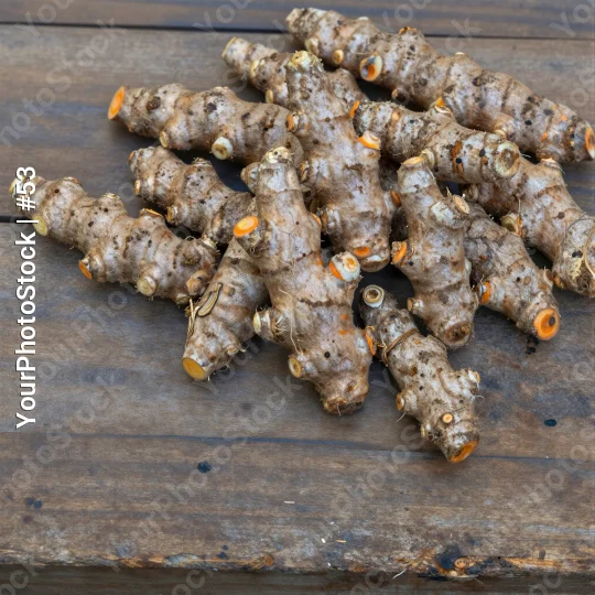 Fresh Ginger Root on Weathered Wood natural product