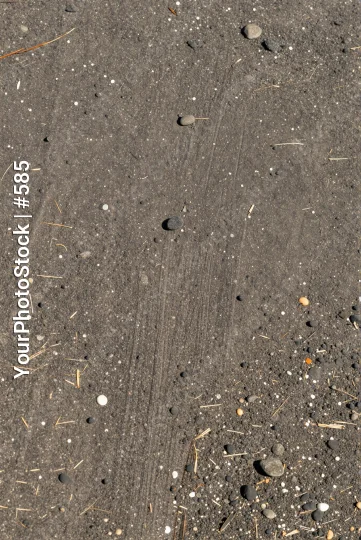 Close-up of Dark Grey Dirt with Circular Pattern ground