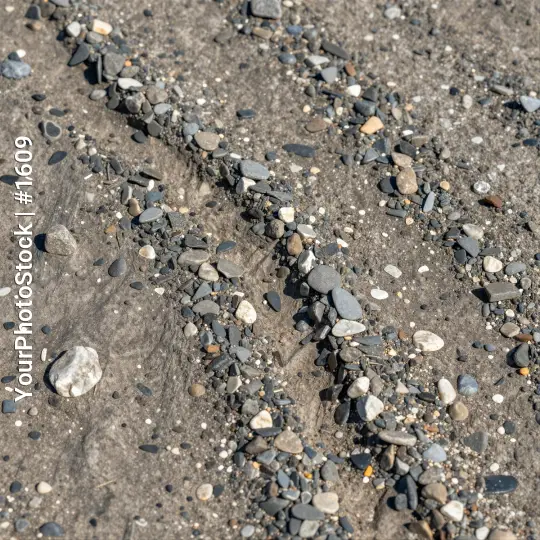 Close-up of Rough Gravel Surface pebbles texture