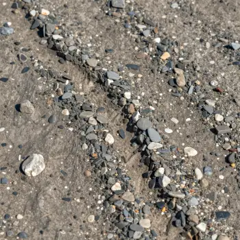 Close-up of Rough Gravel Surface pebbles texture