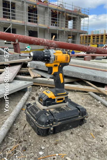 Construction Site Power Drill on Scaffolding building materials